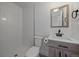 Updated bathroom with a walk-in shower and modern vanity at 9240 W 49Th Ave # 305, Wheat Ridge, CO 80033