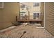 Backyard patio with gravel and access from the deck at 9240 W 49Th Ave # 305, Wheat Ridge, CO 80033