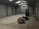 Large workshop with forklift and equipment at 16621 Horizon Dr, Brighton, CO 80601