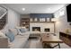 Basement fireplace with a light-colored stone surround at 2860 S Hudson St, Denver, CO 80222