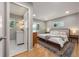 Spacious main bedroom with ensuite bathroom and ample closet space at 2860 S Hudson St, Denver, CO 80222