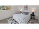 Cozy bedroom with striped bedding and nightstands at 8447 W Dakota Ave # C, Lakewood, CO 80226