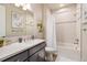 Clean bathroom with bathtub and single vanity at 1481 Harebell St, Berthoud, CO 80513