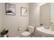 Clean bathroom with updated sink and toilet at 1481 Harebell St, Berthoud, CO 80513
