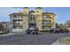 Apartment building with parking in front at 8853 Colorado Blvd # A-106, Thornton, CO 80229