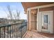 Private balcony with a view of the surrounding neighborhood and trees at 10805 Twenty Mile Rd # 307, Parker, CO 80134