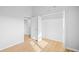 Bright bedroom with double door closet and light wood flooring at 10805 Twenty Mile Rd # 307, Parker, CO 80134