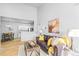 Open concept living area with kitchen views at 10805 Twenty Mile Rd # 307, Parker, CO 80134