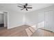 Bright bedroom with hardwood floors and a large closet at 2450 S Lima St, Aurora, CO 80014