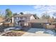 Two story home exterior, featuring a modern garage door at 2450 S Lima St, Aurora, CO 80014