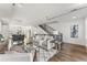 Bright and spacious living room with hardwood floors and modern furniture at 163 S Harrison St, Denver, CO 80209