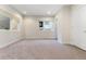 Spacious bedroom with neutral carpeting and large windows at 163 S Harrison St, Denver, CO 80209