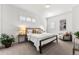 Comfortable bedroom with a queen-size bed and neutral decor at 163 S Harrison St, Denver, CO 80209
