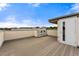 Rooftop deck features composite decking and access door at 163 S Harrison St, Denver, CO 80209
