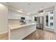 Modern kitchen featuring island and stainless steel appliances at 163 S Harrison St, Denver, CO 80209