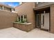 Modern brick home with private entrance and small patio at 163 S Harrison St, Denver, CO 80209