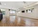 Open concept living area with hardwood floors and garage view at 163 S Harrison St, Denver, CO 80209