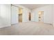 Large bedroom with two closets and access to a bathroom at 163 S Harrison St, Denver, CO 80209