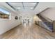 Open living space with hardwood floors and garage access at 163 S Harrison St, Denver, CO 80209