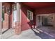 Attached garage and private entry with brick accents at 818 S Terry St # 85, Longmont, CO 80501