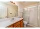 Clean bathroom with a shower/tub combo and wood vanity at 818 S Terry St # 85, Longmont, CO 80501