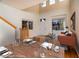 Virtually staged dining area and living room at 818 S Terry St # 85, Longmont, CO 80501