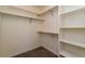 Large walk-in closet with double hanging rods and shelving at 818 S Terry St # 85, Longmont, CO 80501