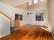 Living room with hardwood floors and high ceilings at 818 S Terry St # 85, Longmont, CO 80501
