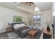 Virtually staged main bedroom with a private balcony at 818 S Terry St # 85, Longmont, CO 80501