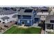 Aerial view of a new home community with solar panels at 45780 Silverdrop Ave, Bennett, CO 80102