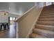 Staircase with carpeted steps leading to the upper level at 45780 Silverdrop Ave, Bennett, CO 80102