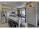 Modern kitchen with granite countertops and stainless steel appliances at 45780 Silverdrop Ave, Bennett, CO 80102