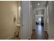 Clean and updated half bathroom with pedestal sink at 45780 Silverdrop Ave, Bennett, CO 80102