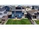 Aerial view of neighborhood with solar panels at 45780 Silverdrop Ave, Bennett, CO 80102