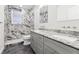 Bathroom with double vanity, marble tile shower, and modern fixtures at 4233 Vallejo St, Denver, CO 80211