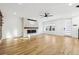 Spacious living room featuring hardwood floors and fireplace at 4233 Vallejo St, Denver, CO 80211