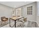 Home office with built-in desk and neutral color palette at 10527 Skyreach Rd, Highlands Ranch, CO 80126