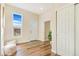 Bright entryway with wood-look floors and access to other rooms at 614 W 4Th Ave, Denver, CO 80223