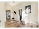 Sunlit hallway with laundry access and stylish decor at 614 W 4Th Ave, Denver, CO 80223