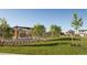 Expansive park with a pergola and well-maintained lawn at 708 N Bently St, Watkins, CO 80137