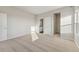 Spacious bedroom with carpet, and an ensuite bathroom at 3012 Oxley St, Strasburg, CO 80136