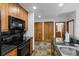 Well-equipped kitchen with modern appliances and granite countertops at 34 Highfield Trl # 203, Breckenridge, CO 80424