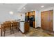 Eat-in kitchen with a breakfast bar and dark appliances at 34 Highfield Trl # 203, Breckenridge, CO 80424