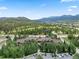 Aerial view of the property, showcasing the building and surrounding landscape at 34 Highfield Trl # 203, Breckenridge, CO 80424