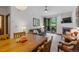 Cozy dining area with wooden table and access to the living room at 34 Highfield Trl # 203, Breckenridge, CO 80424