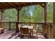 Covered deck with outdoor furniture and mountain views at 34 Highfield Trl # 203, Breckenridge, CO 80424