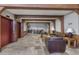 Lobby with comfortable seating, fireplace, and elevators at 34 Highfield Trl # 203, Breckenridge, CO 80424