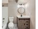 Updated bathroom with a stylish vanity and modern lighting at 909 S Dawson Way # 7, Aurora, CO 80012