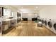 Convenient laundry room with multiple washers and dryers at 12983 W Ida Ave # 217, Littleton, CO 80127