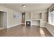 Spacious living room with fireplace and hardwood floors at 4037 S Odessa Cir, Aurora, CO 80013